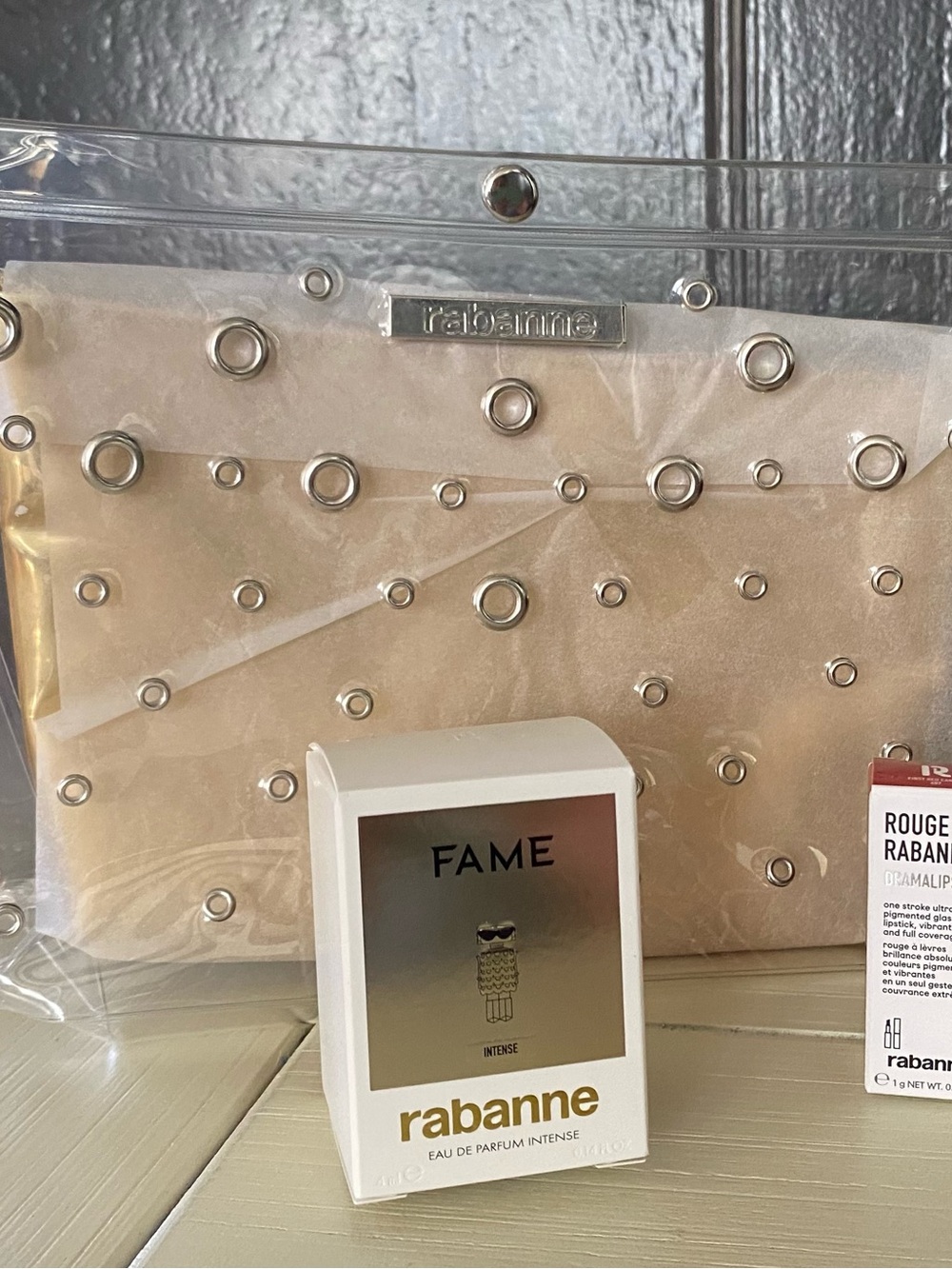 Rabanne Clear Studded Pouch with gold inner